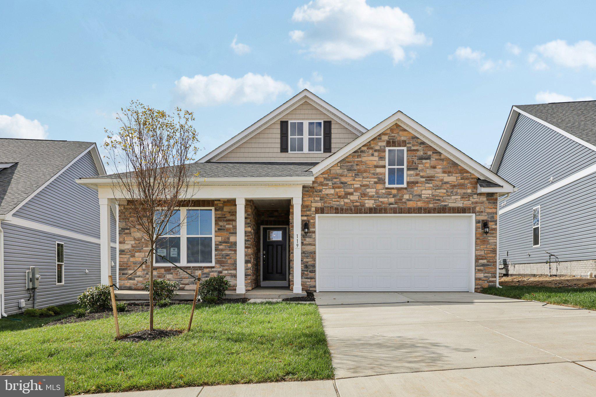 234 Hydrangea Way Winchester, VA 22602 - Photo 1 of 54 a front view of a house with a yard