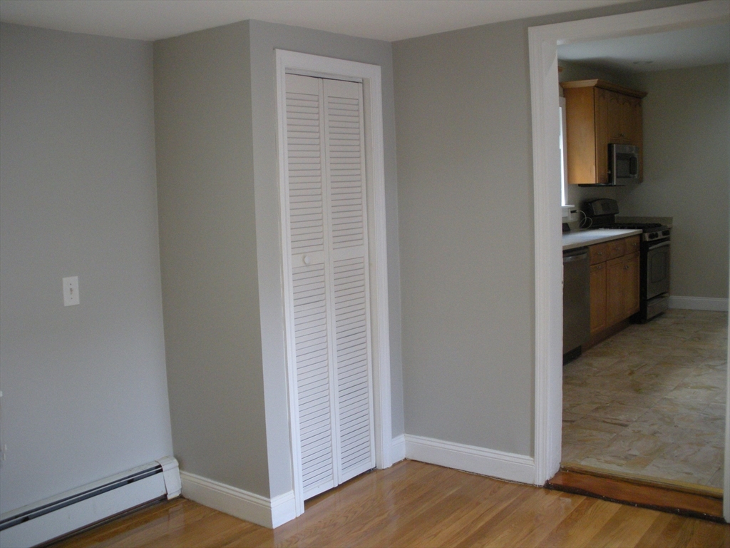 113 Rockland Street, Unit 1 Canton, MA 02021 - Photo 6 of 9 a view of kitchen and utility room