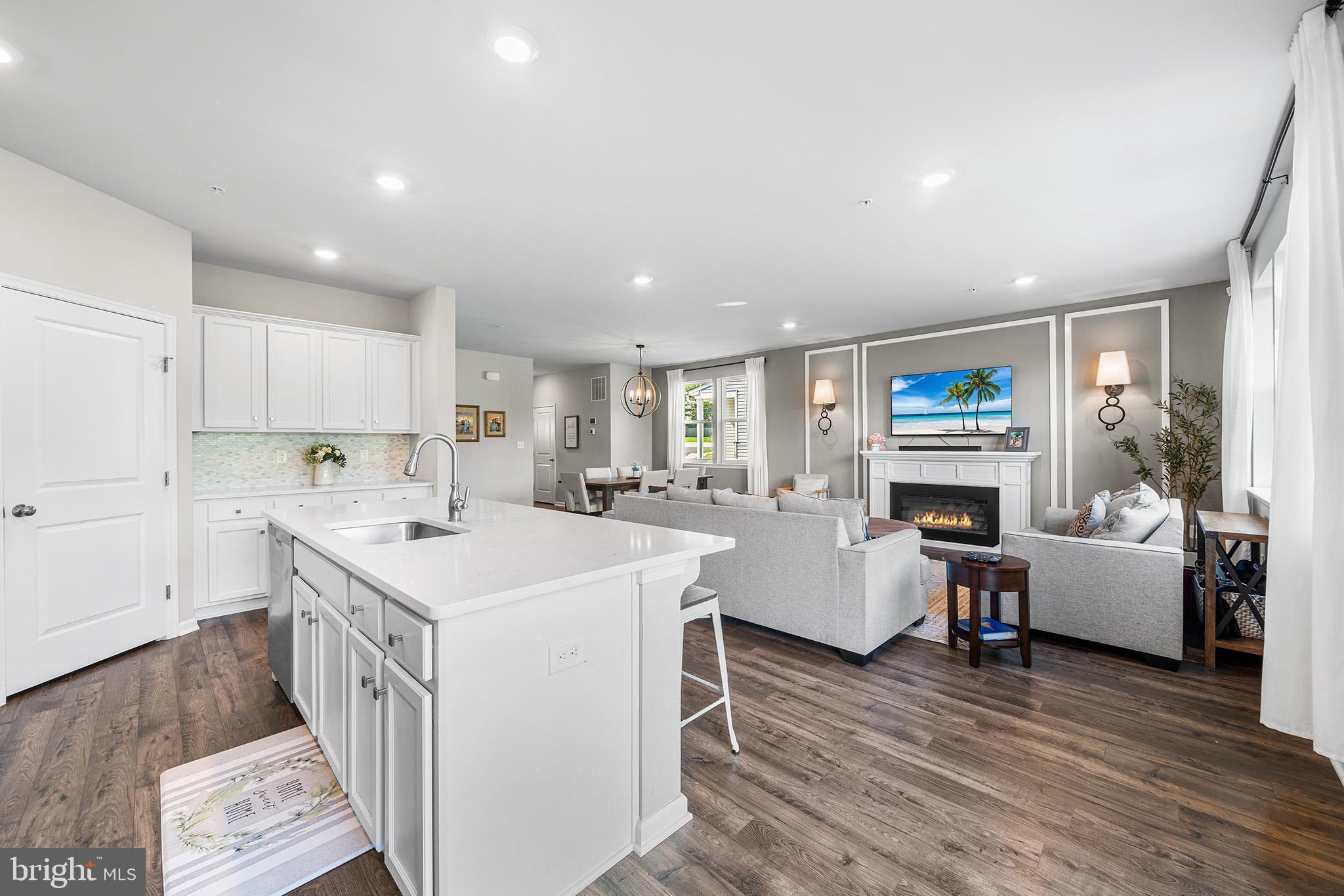 43 Hummingbird Lane Phoenixville, PA 19460 - Photo 15 of 44 a living room with furniture and a wooden floor