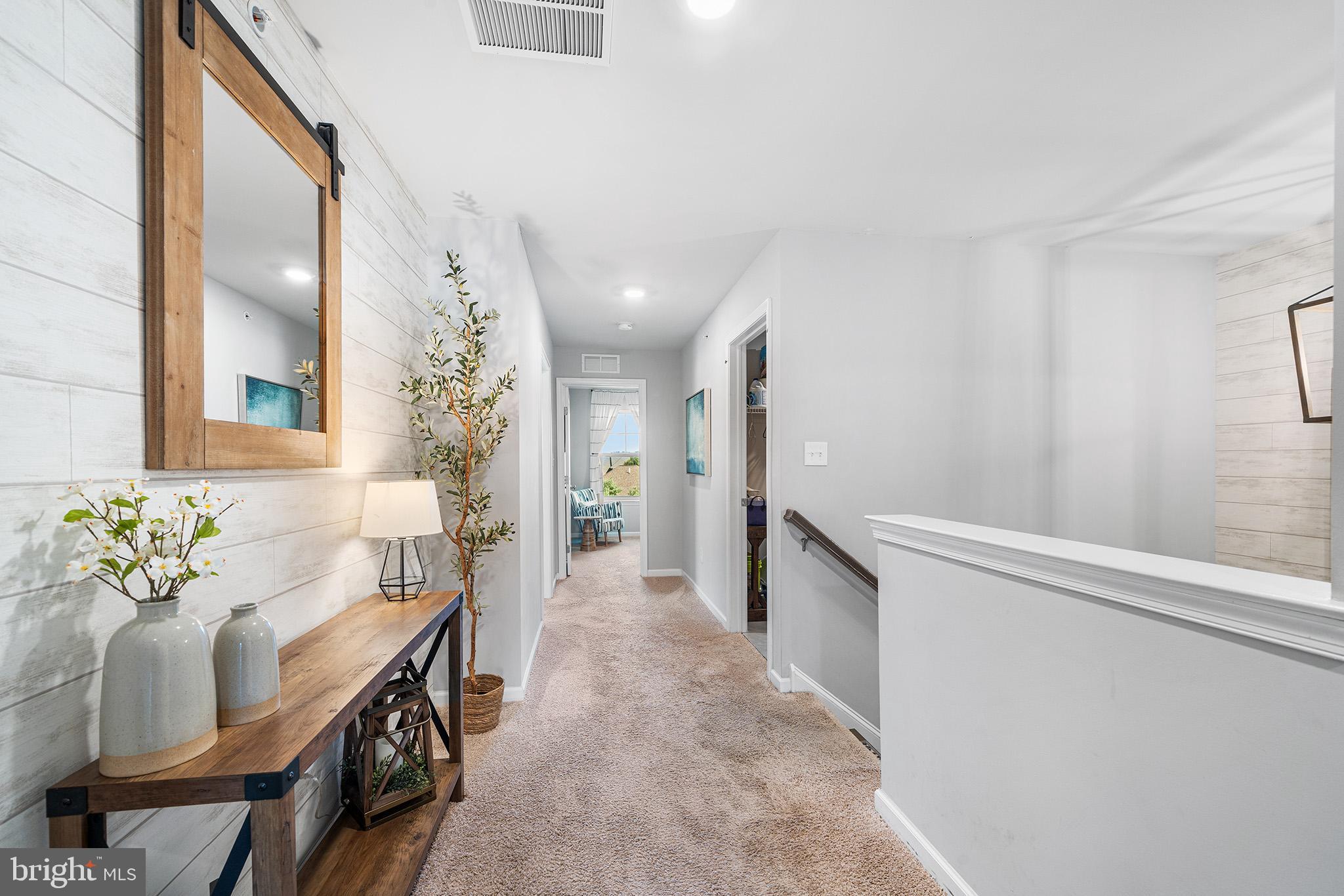 43 Hummingbird Lane Phoenixville, PA 19460 - Photo 17 of 44 a hallway with furniture and wooden floor