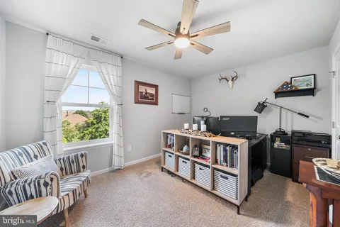 a room with furniture and a window