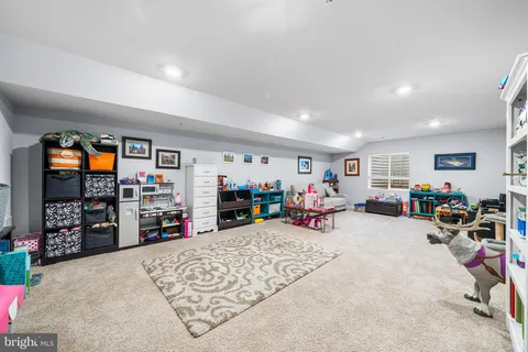 a view of a garage with a bike and car