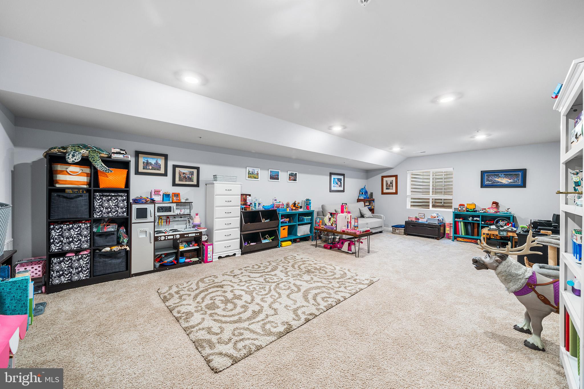 43 Hummingbird Lane Phoenixville, PA 19460 - Photo 32 of 44 a view of a garage with a bike and car