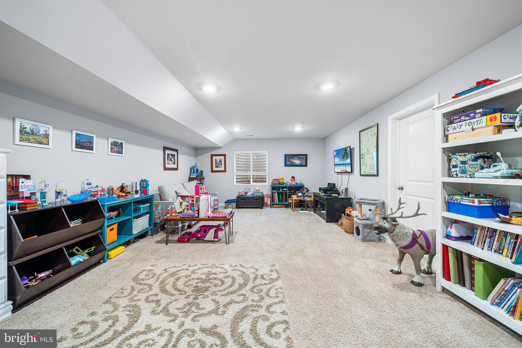 43 Hummingbird Lane Phoenixville, PA 19460 - Photo 33 of 44 a bed room with furniture and a book shelf