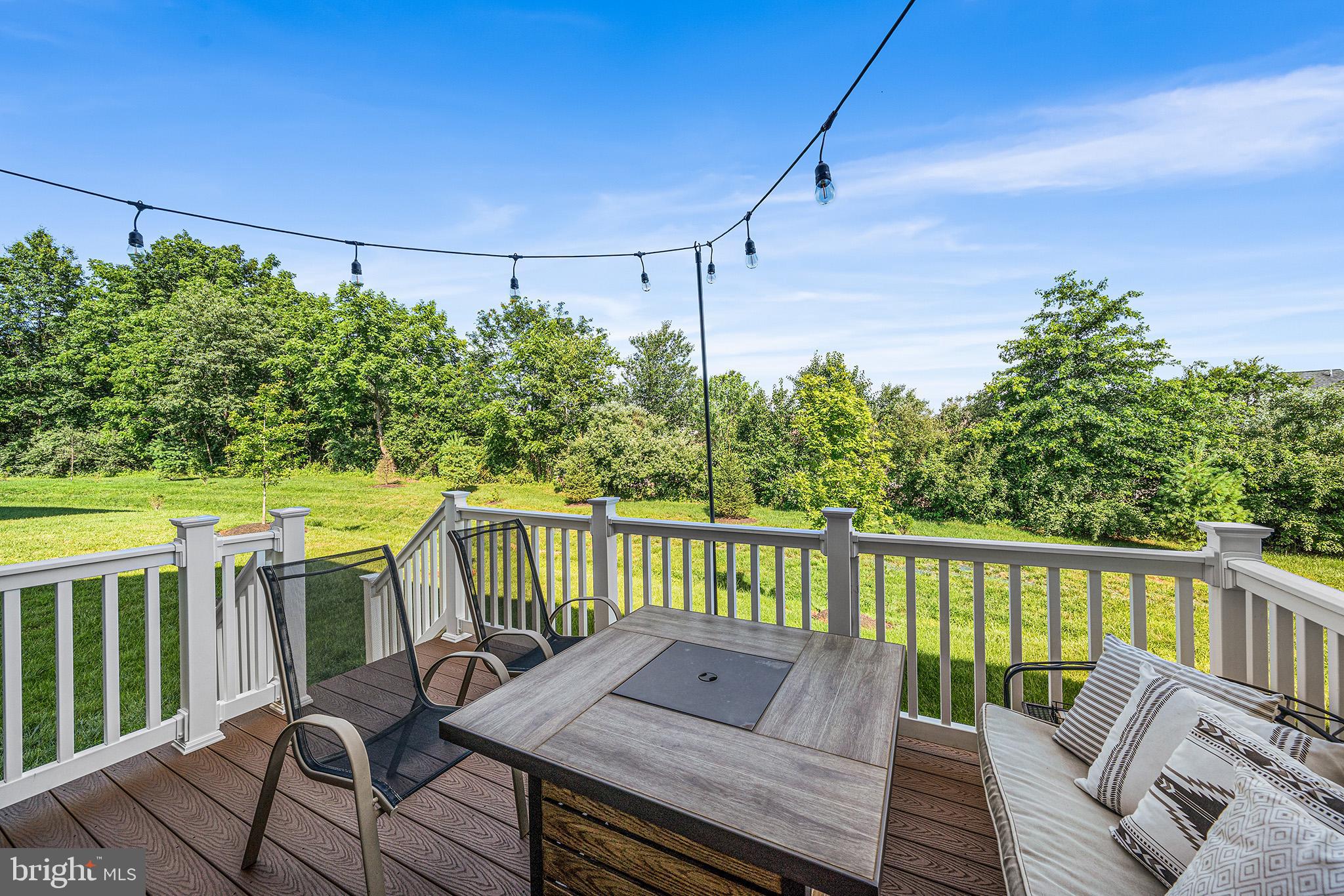 43 Hummingbird Lane Phoenixville, PA 19460 - Photo 34 of 44 a balcony with wooden floor and outdoor seating