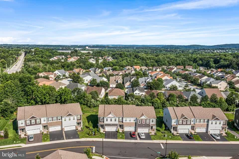 an aerial view of residential house with outdoor space