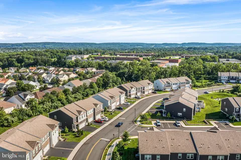 an aerial view of a city with lots of residential buildings