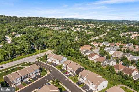 an aerial view of residential house with outdoor space and river