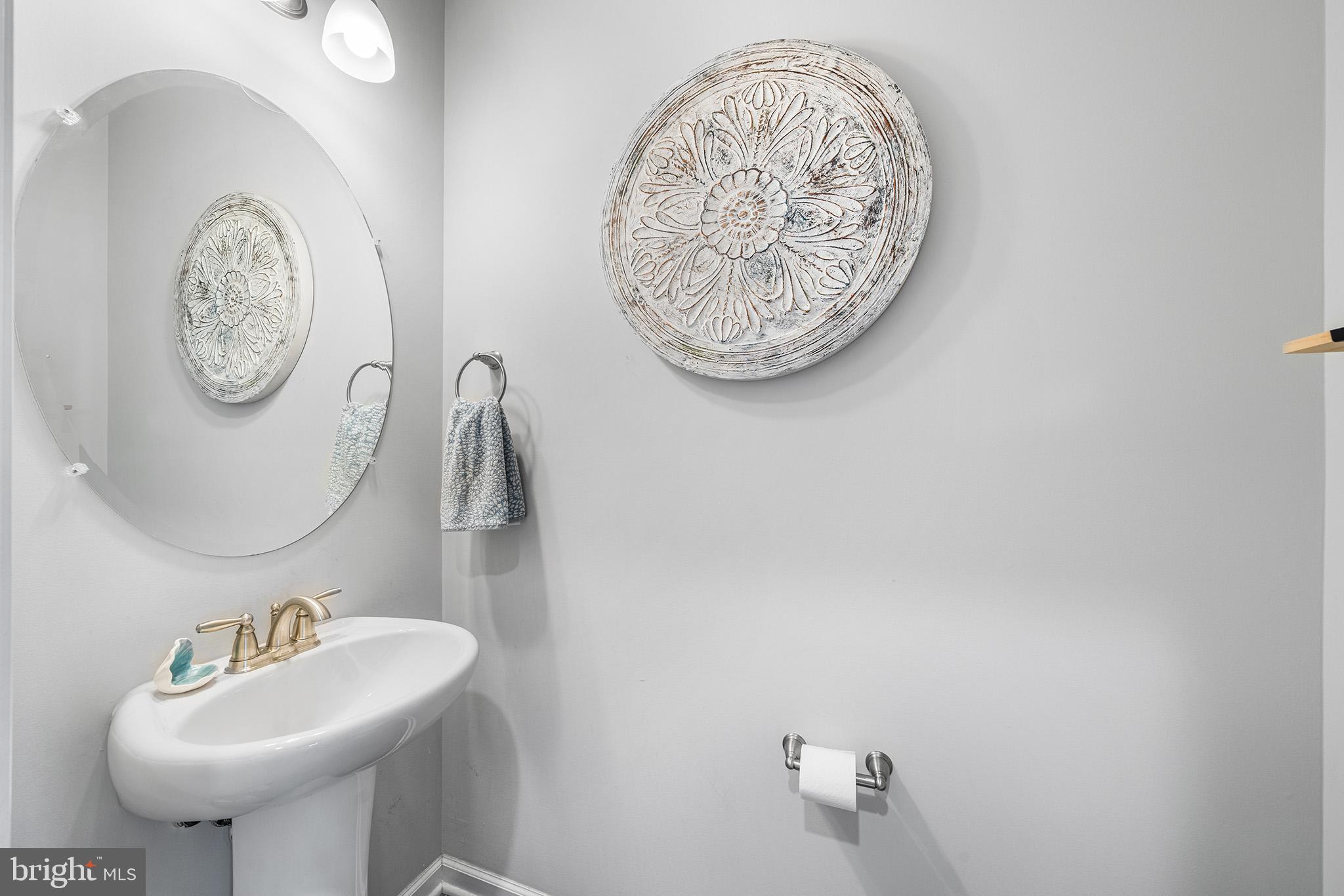 43 Hummingbird Lane Phoenixville, PA 19460 - Photo 5 of 44 a bathroom with a sink and a mirror