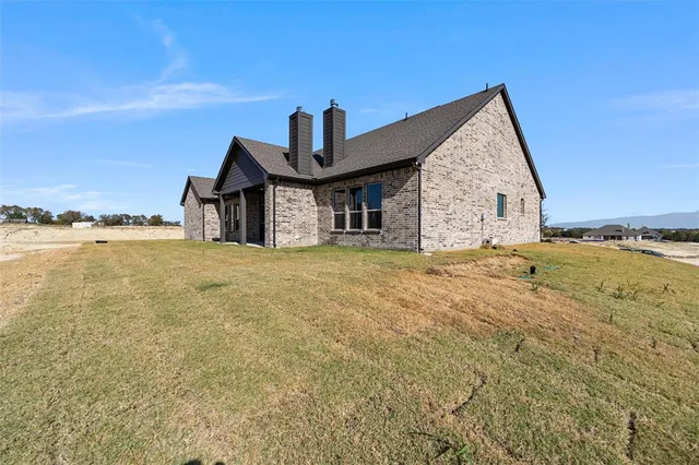a picture of a bathroom with a sink a mirror and a picture of a bathroom