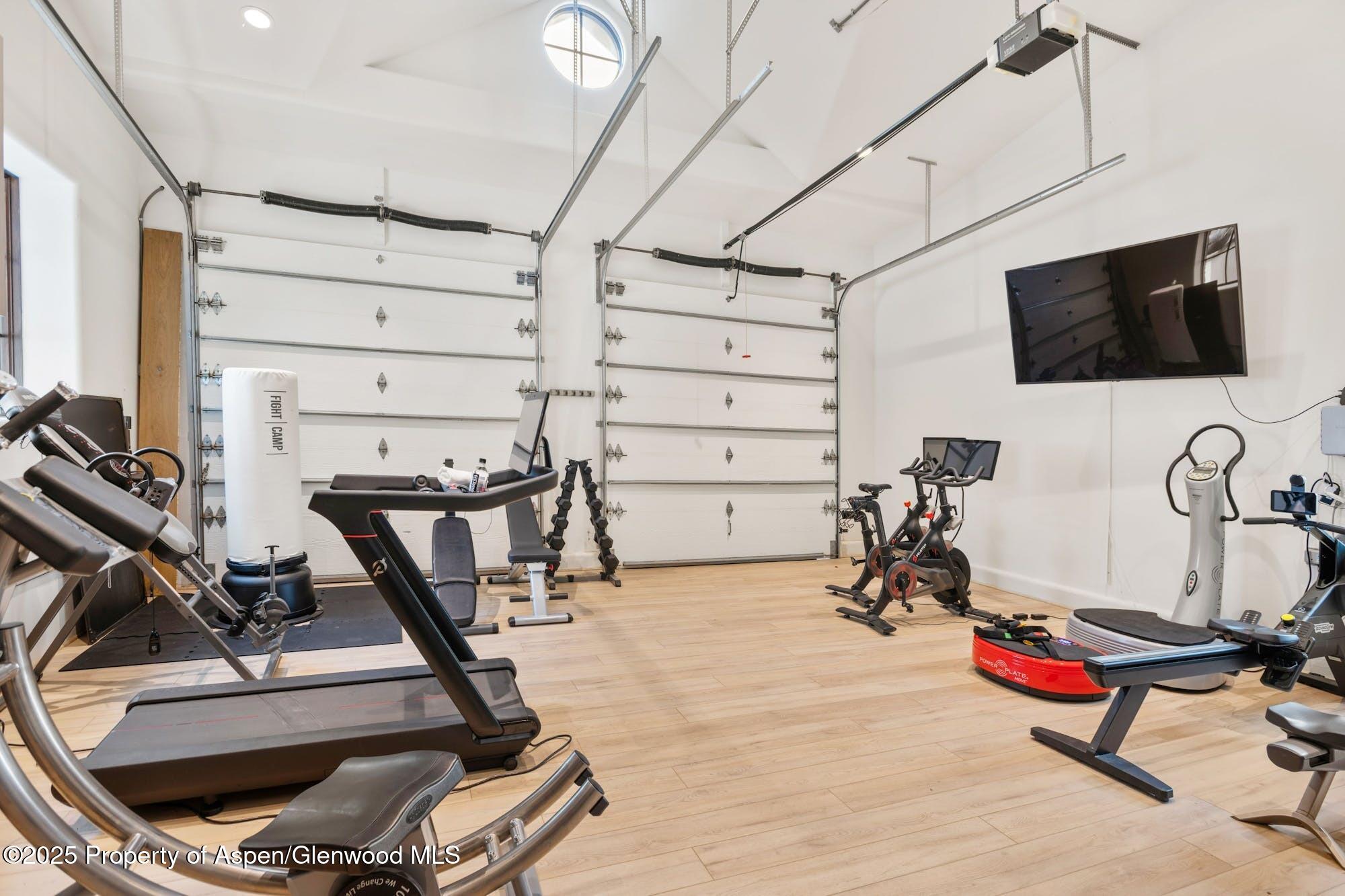 350 Spruce Ridge Lane Snowmass Village, CO 81615 - Photo 35 of 38 a view of a room with gym equipment