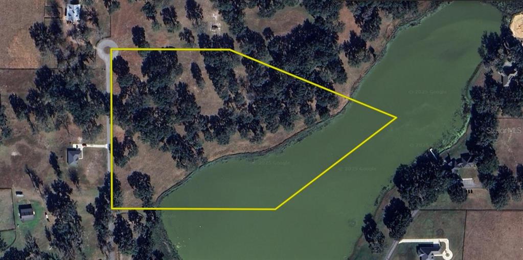 301 Off Highway Summerfield, FL 34491 - Photo 6 of 29 a view of a tennis court