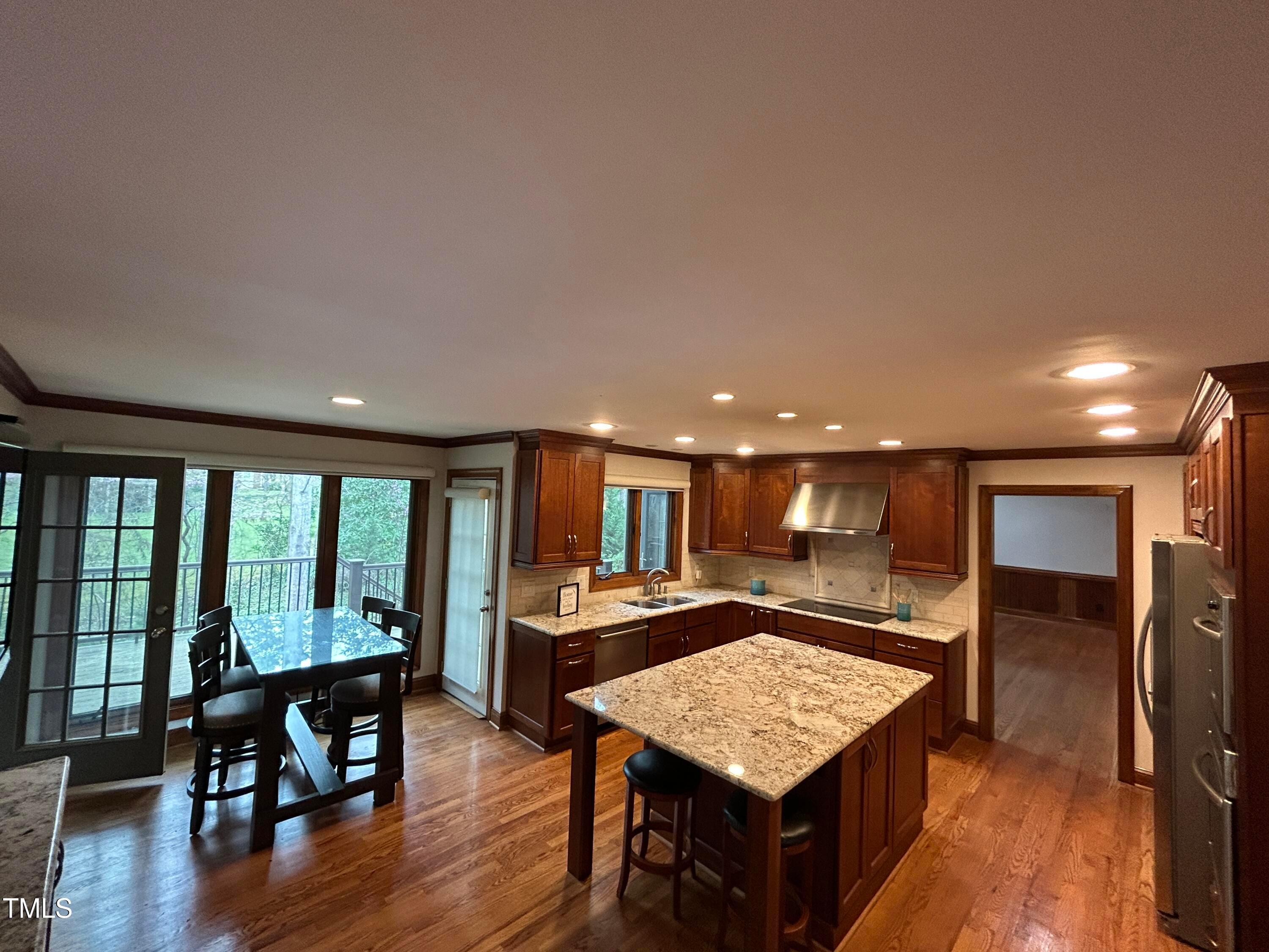 106 Springbrook Place Cary, NC 27518 - Photo 12 of 49 a kitchen with a table and chairs in it