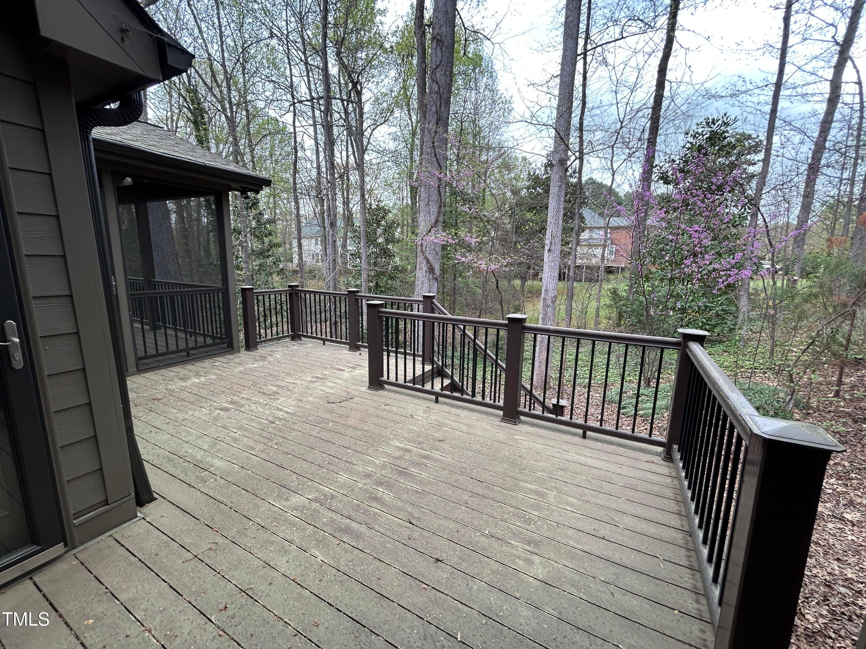 106 Springbrook Place Cary, NC 27518 - Photo 16 of 49 a view of a wooden deck