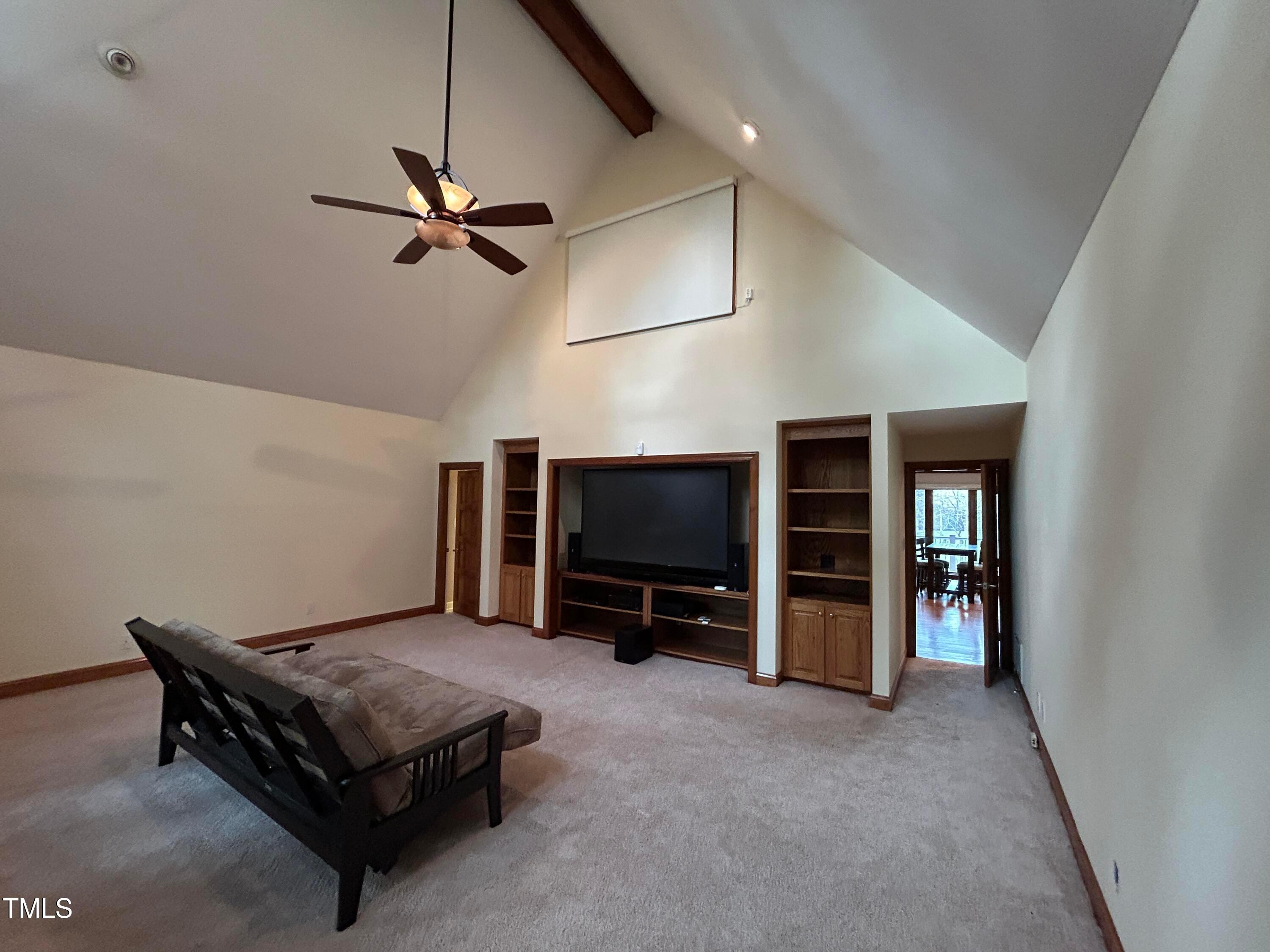 106 Springbrook Place Cary, NC 27518 - Photo 18 of 49 a living room with furniture and a flat screen tv