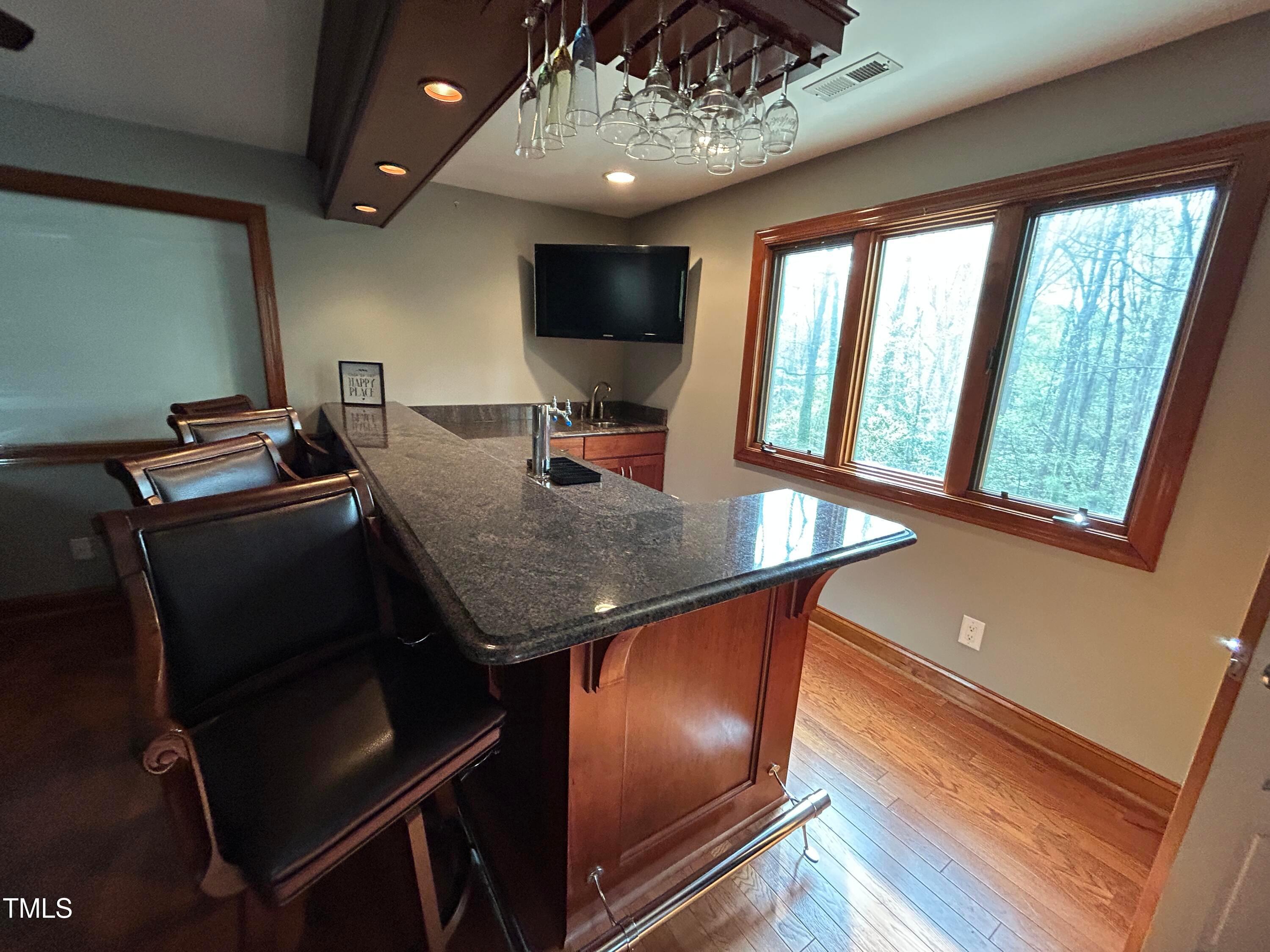 106 Springbrook Place Cary, NC 27518 - Photo 30 of 49 a view of a workspace with furniture and a window
