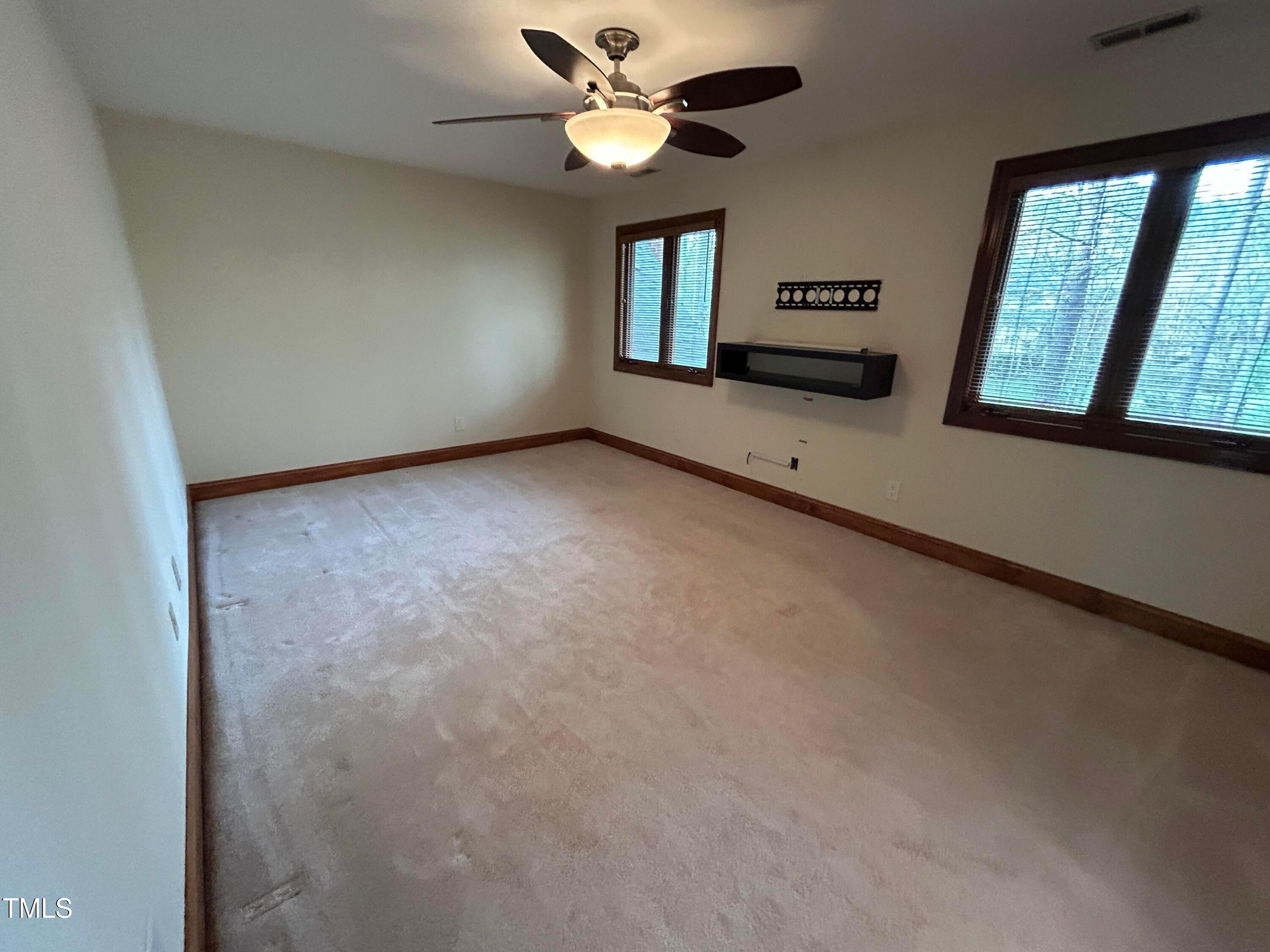 106 Springbrook Place Cary, NC 27518 - Photo 34 of 49 a view of an empty room with a window