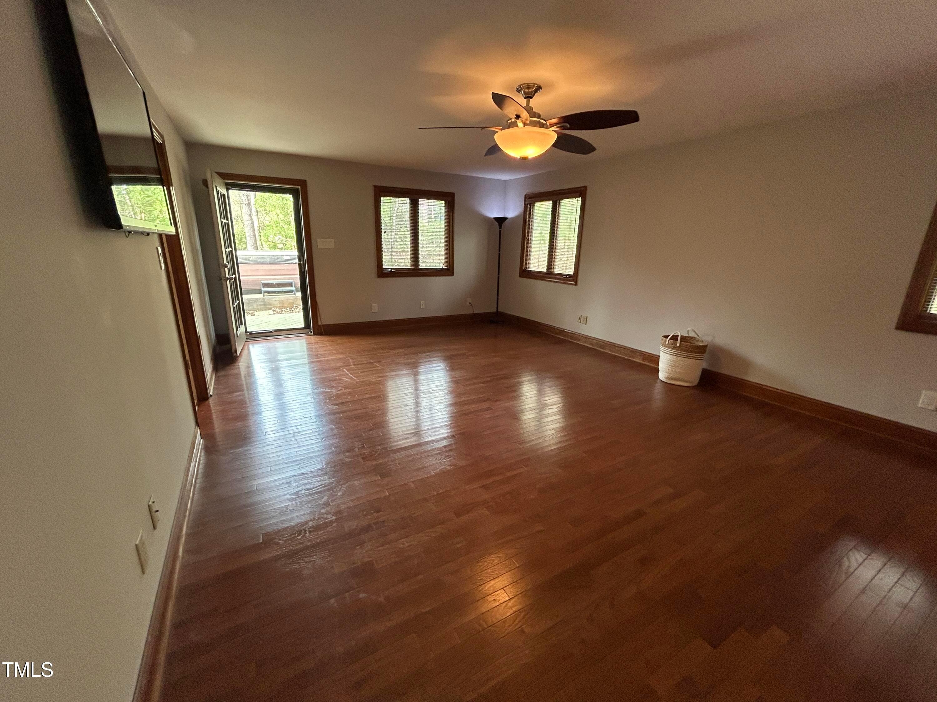 106 Springbrook Place Cary, NC 27518 - Photo 39 of 49 a view of livingroom with hardwood floor and window