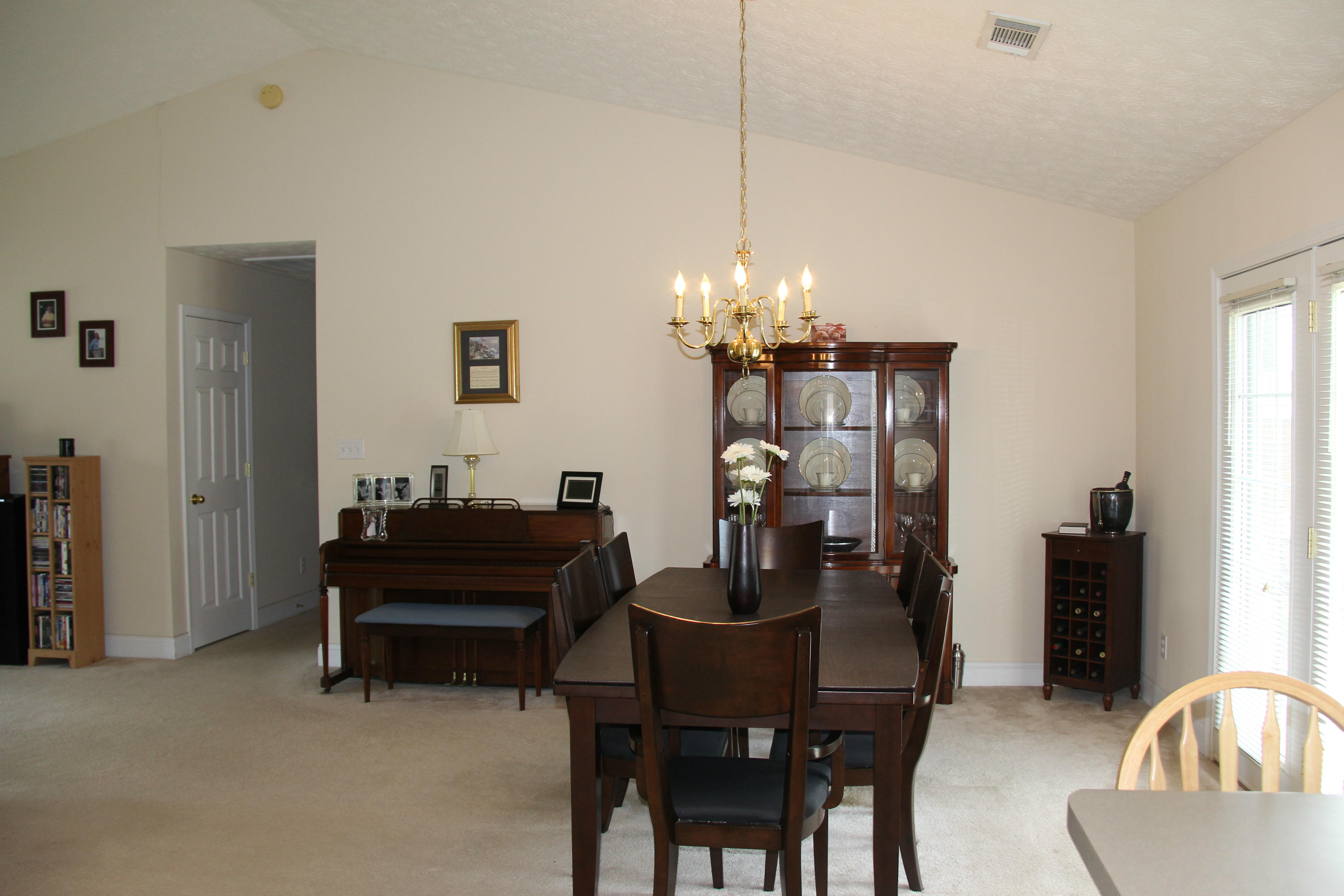 7036 Ghiradelli Road Knoxville, TN 37918 - Photo 5 of 24 Cathedral ceiling in living/dining room