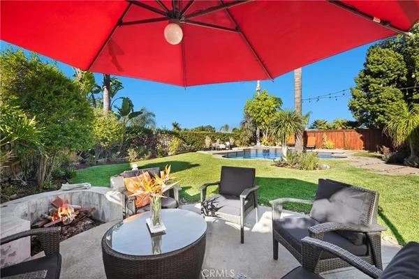 a view of an chairs and tables in the patio