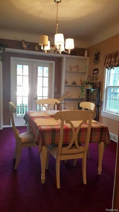 4344 Lapeer Road Burton, MI 48509 - Photo 14 of 48 French Doors to Side Covered Porch
