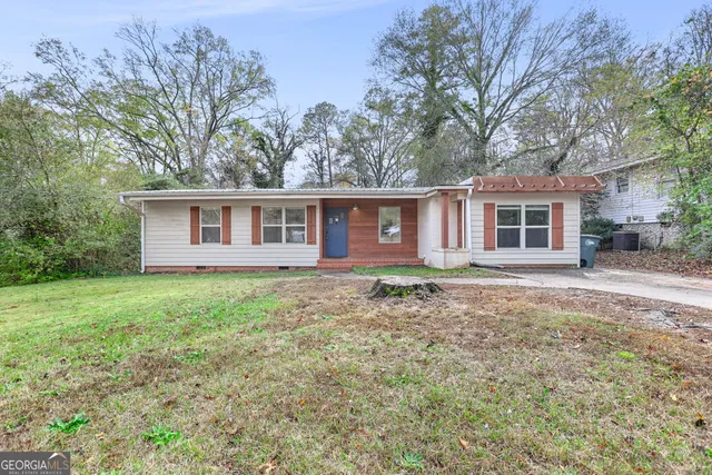 front view of a house with a yard