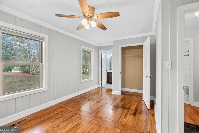 a view of an empty room and window