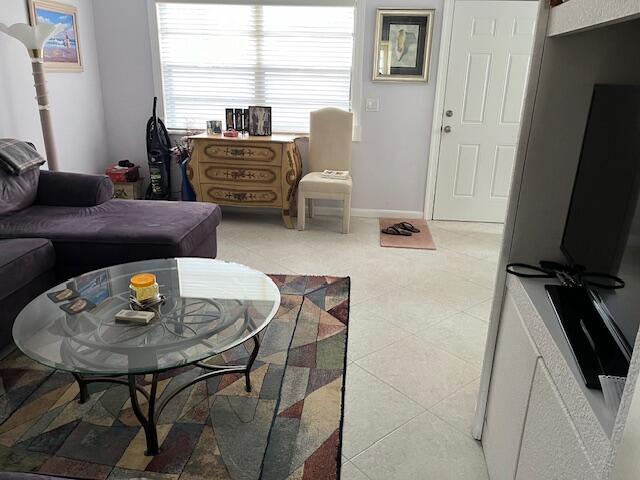 247 Capri F Delray Beach, FL 33484 - Photo 5 of 14 a dining room with furniture and window