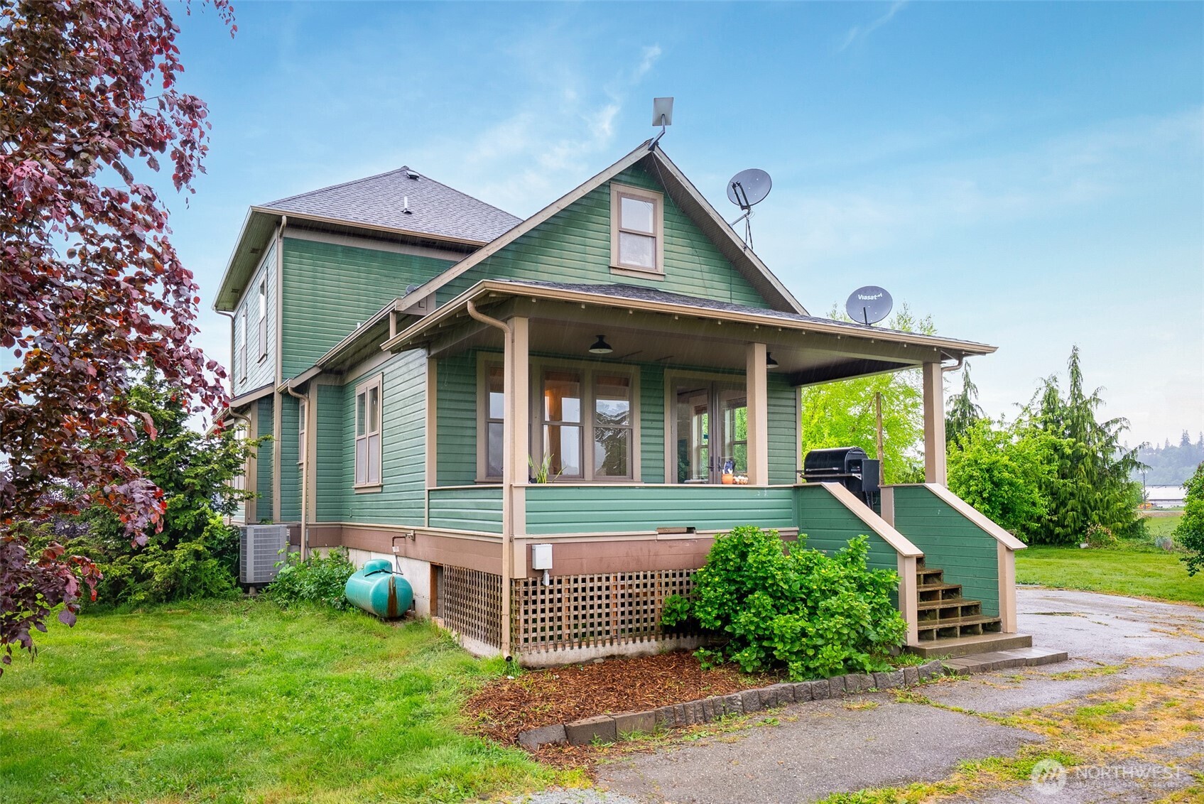 2304 Norman Road Stanwood, WA 98292 - Photo 21 of 39 a front view of a house with garden