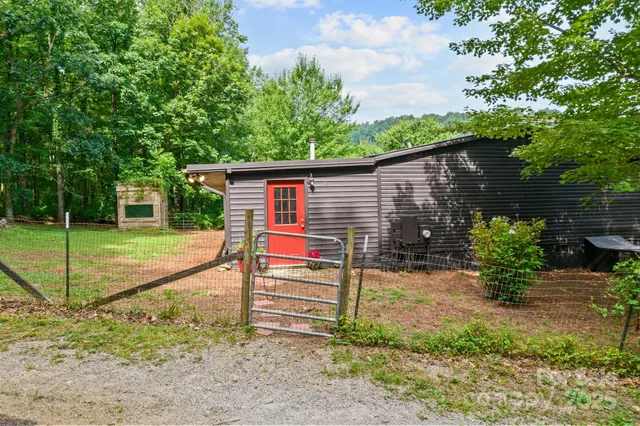 a backyard of a house with lots of green space