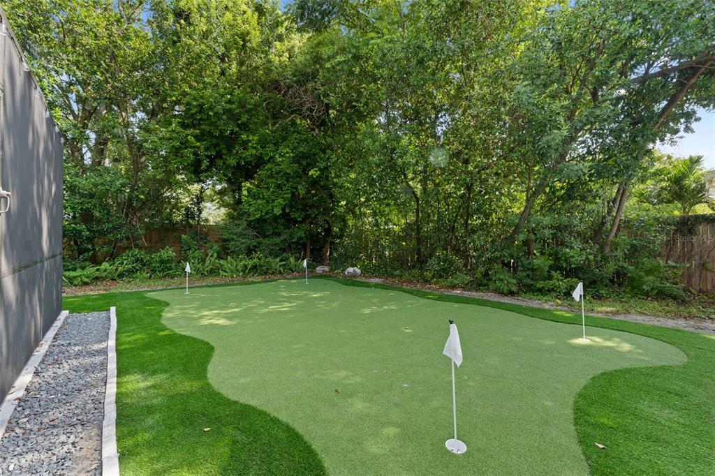 1830 Lakeview Road Clearwater, FL 33764 - Photo 35 of 38 a backyard of a house with lots of green space