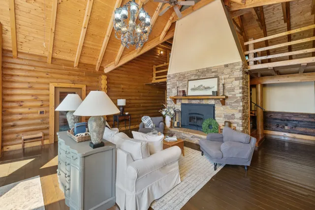 a view of a porch with wooden floor and stairs