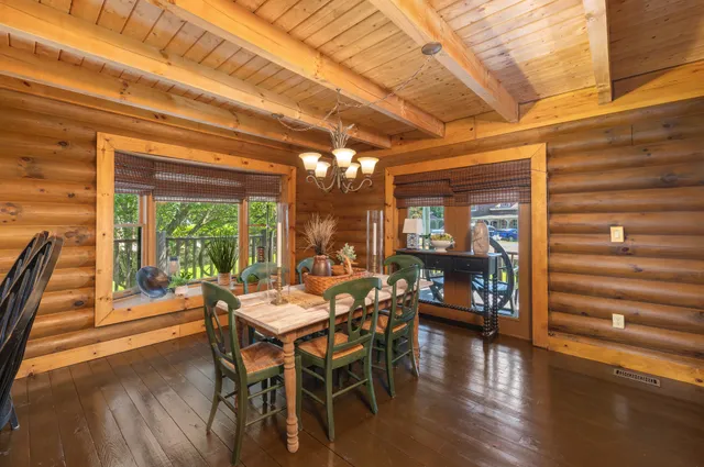 a view of hallway with wooden floor