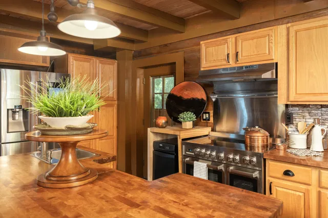 a view of a livingroom with furniture and a flat screen tv