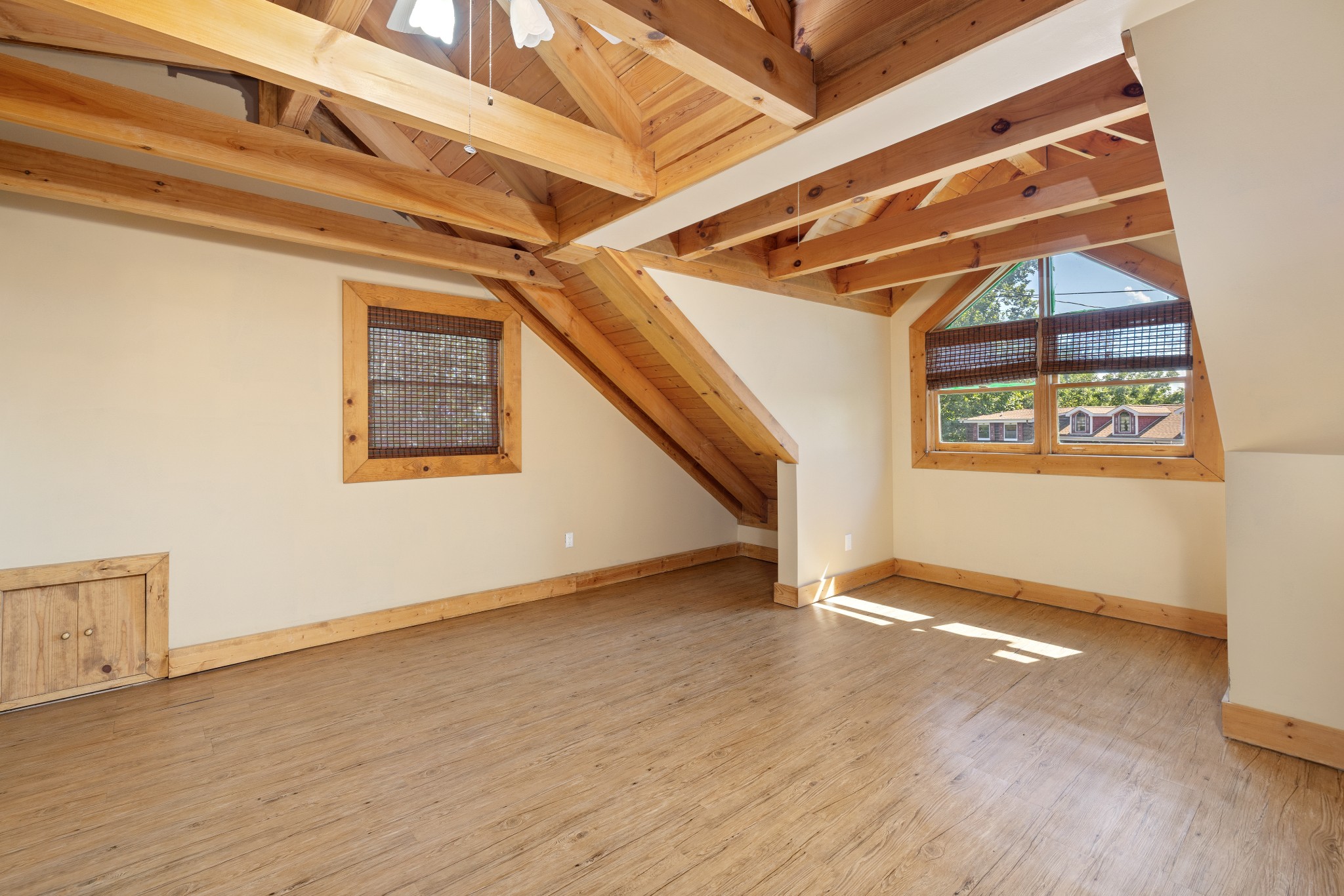 158 Dillon Road Baxter, TN 38544 - Photo 45 of 93 an empty room with wooden floor and windows