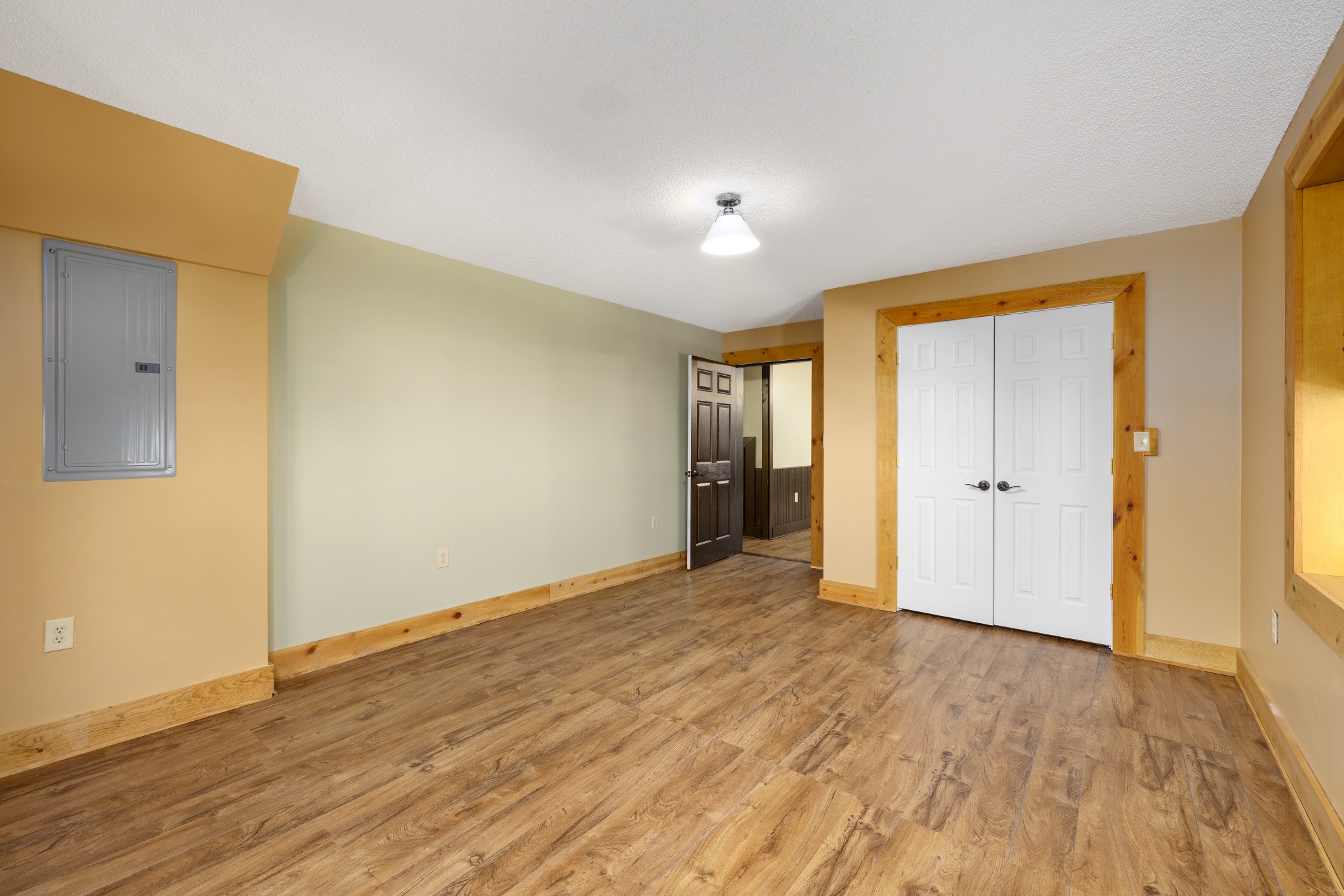 158 Dillon Road Baxter, TN 38544 - Photo 55 of 93 a view of an empty room with wooden floor and closet area