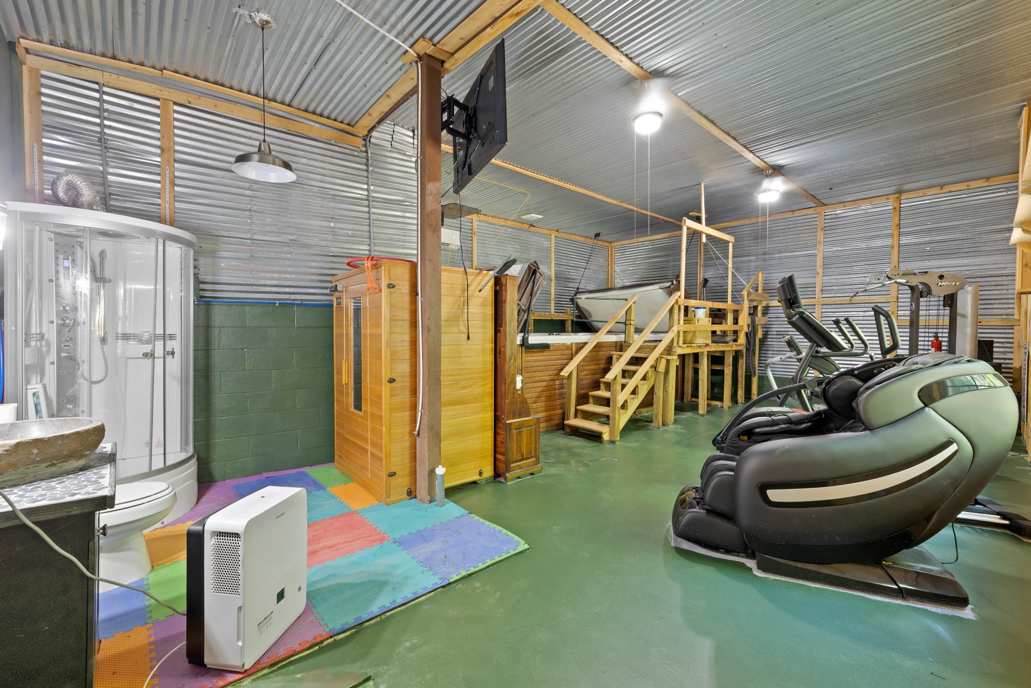 158 Dillon Road Baxter, TN 38544 - Photo 64 of 93 a room with gym equipment and a large window