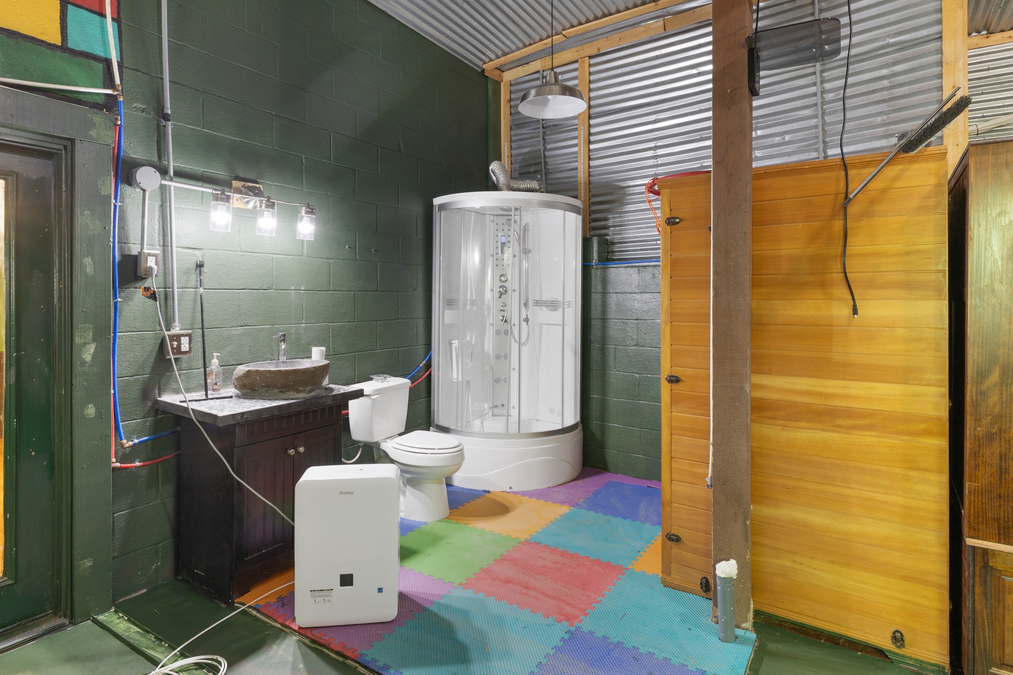 158 Dillon Road Baxter, TN 38544 - Photo 65 of 93 a bathroom with a sink a toilet and shower