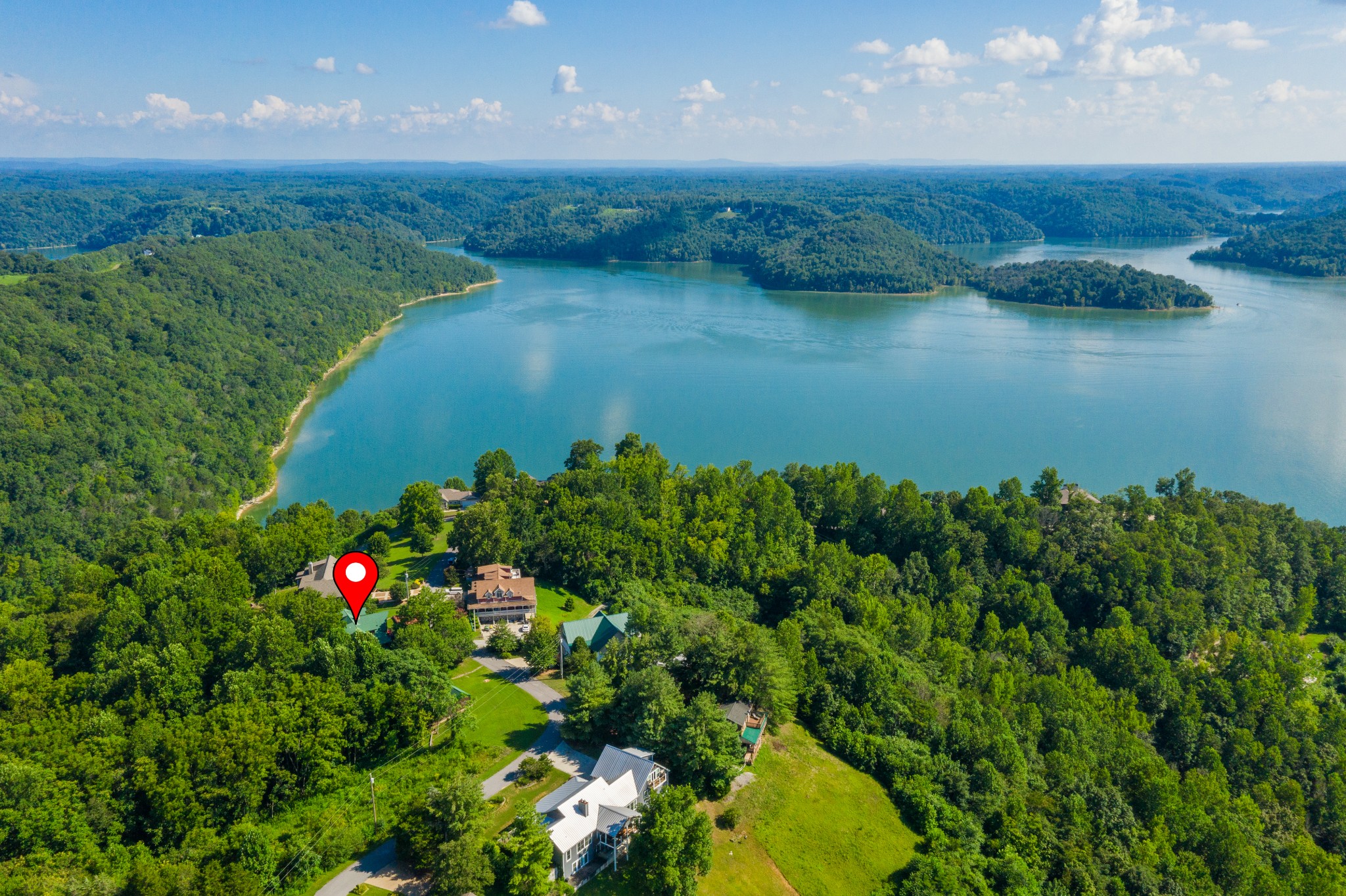 158 Dillon Road Baxter, TN 38544 - Photo 88 of 93 an aerial view of lake residential house and space with swimming pool
