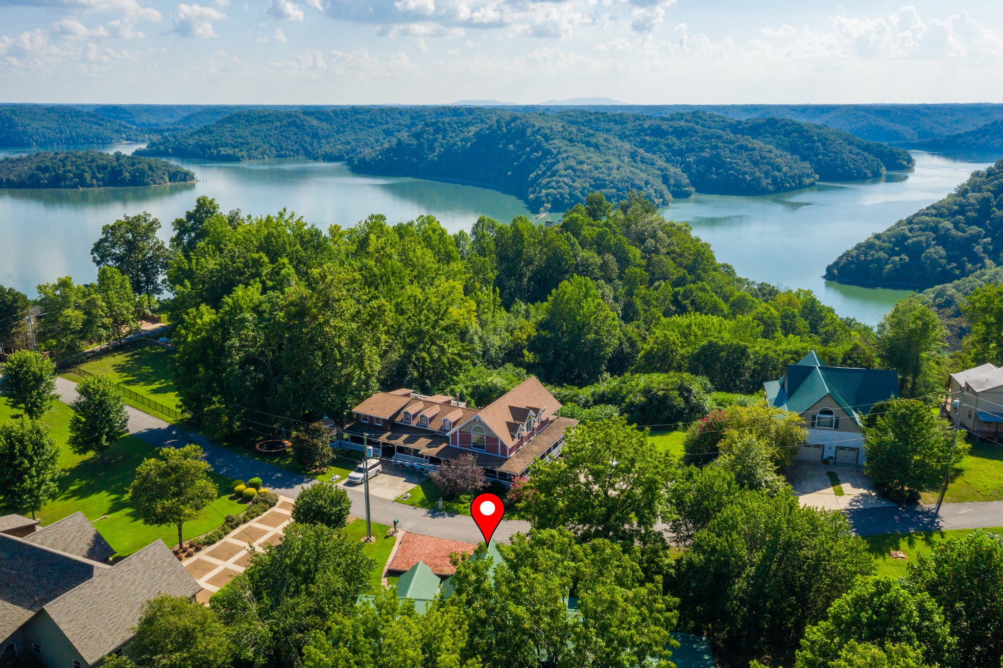 158 Dillon Road Baxter, TN 38544 - Photo 91 of 93 an aerial view of residential house with outdoor space and lake view