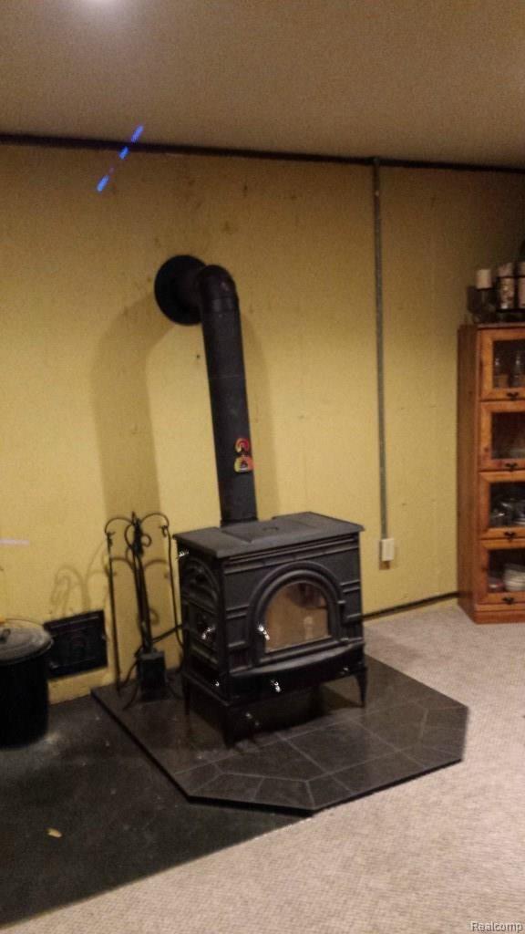 7529 West Coon Lake Road Gregory, MI 48137 - Photo 5 of 13 7529 Coon Lake woodstove.jpg