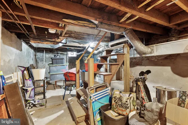 a sign that is sitting on a wooden floor