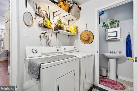 a utility room with dryer and washer