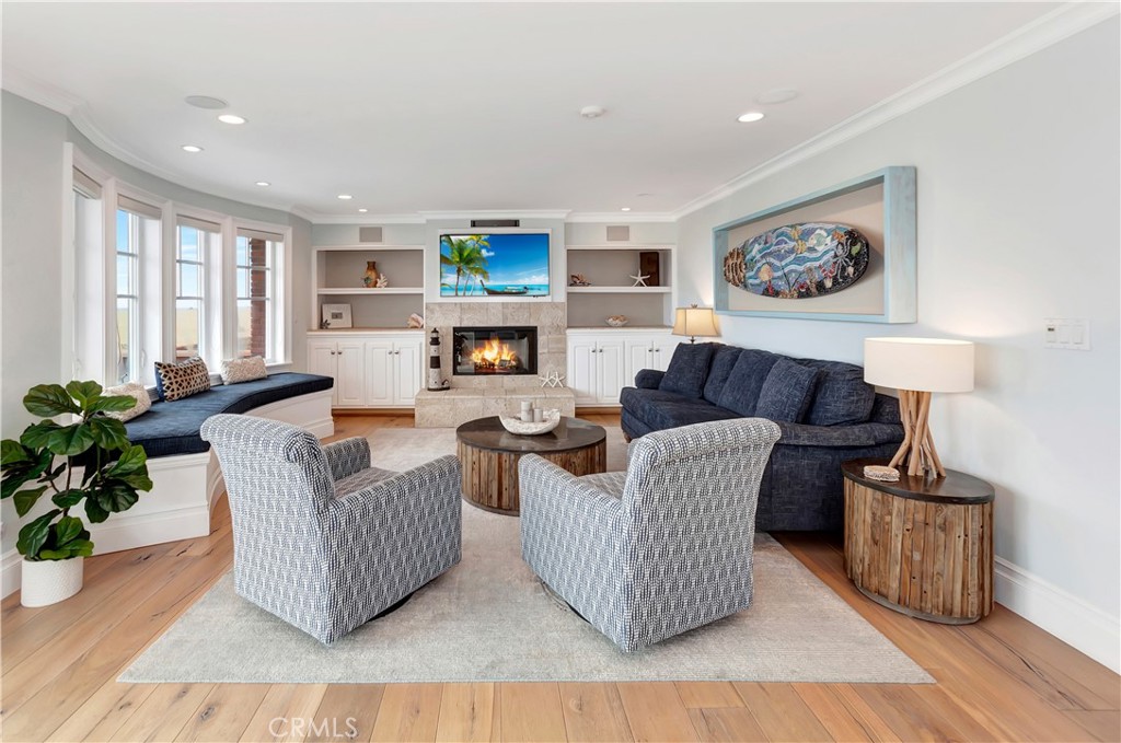 1102 West Oceanfront Newport Beach, CA 92661 - Photo 6 of 32 a living room with furniture and a couch