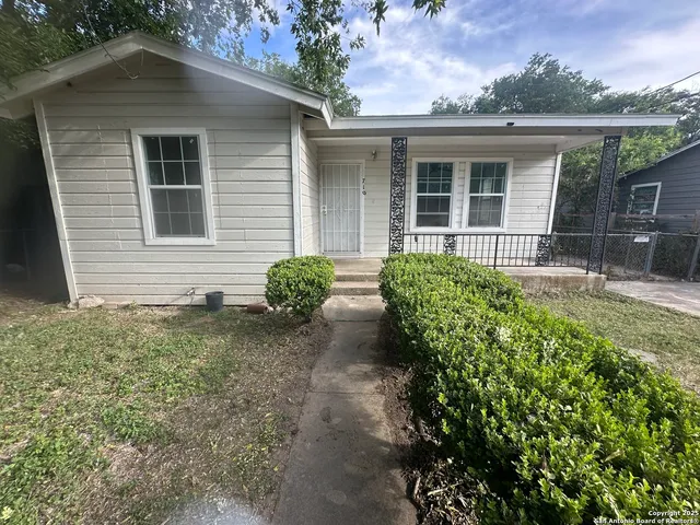 front view of house with a yard