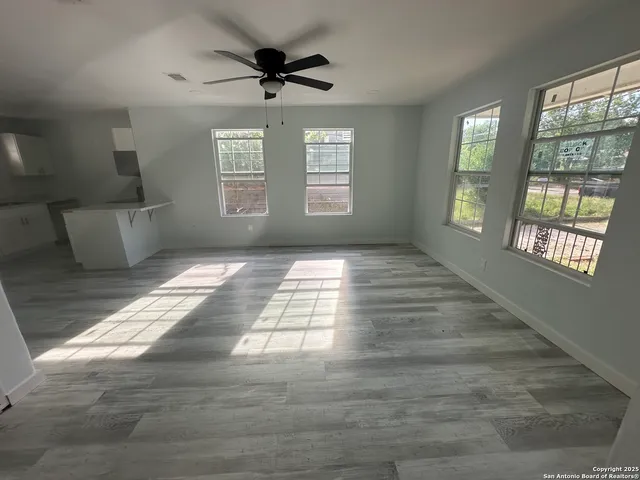 a view of an empty room and window