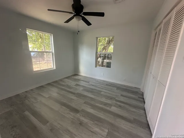 a view of an empty room and window