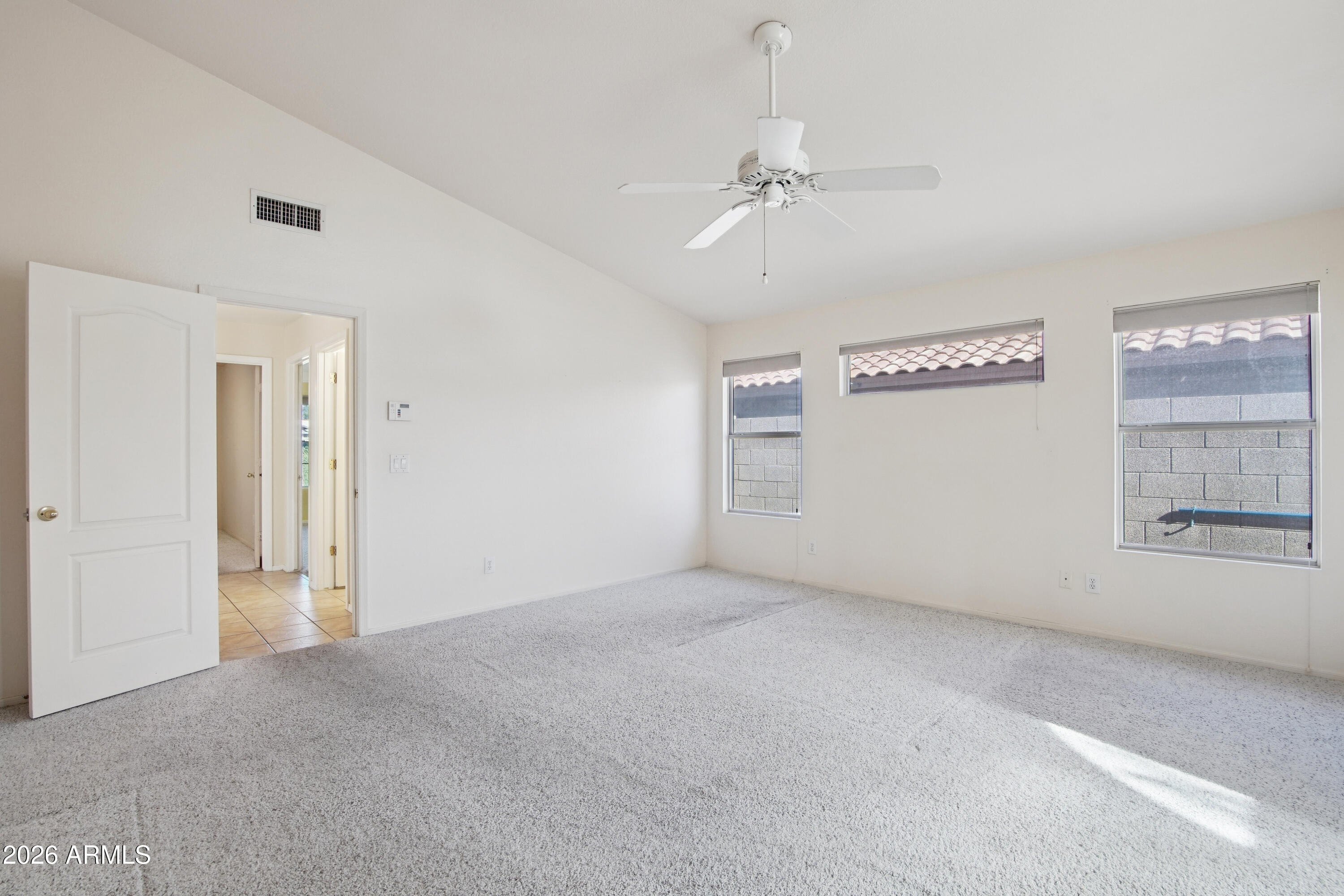9729 West Burnett Road Peoria, AZ 85382 - Photo 14 of 29 a view of an empty room with a window