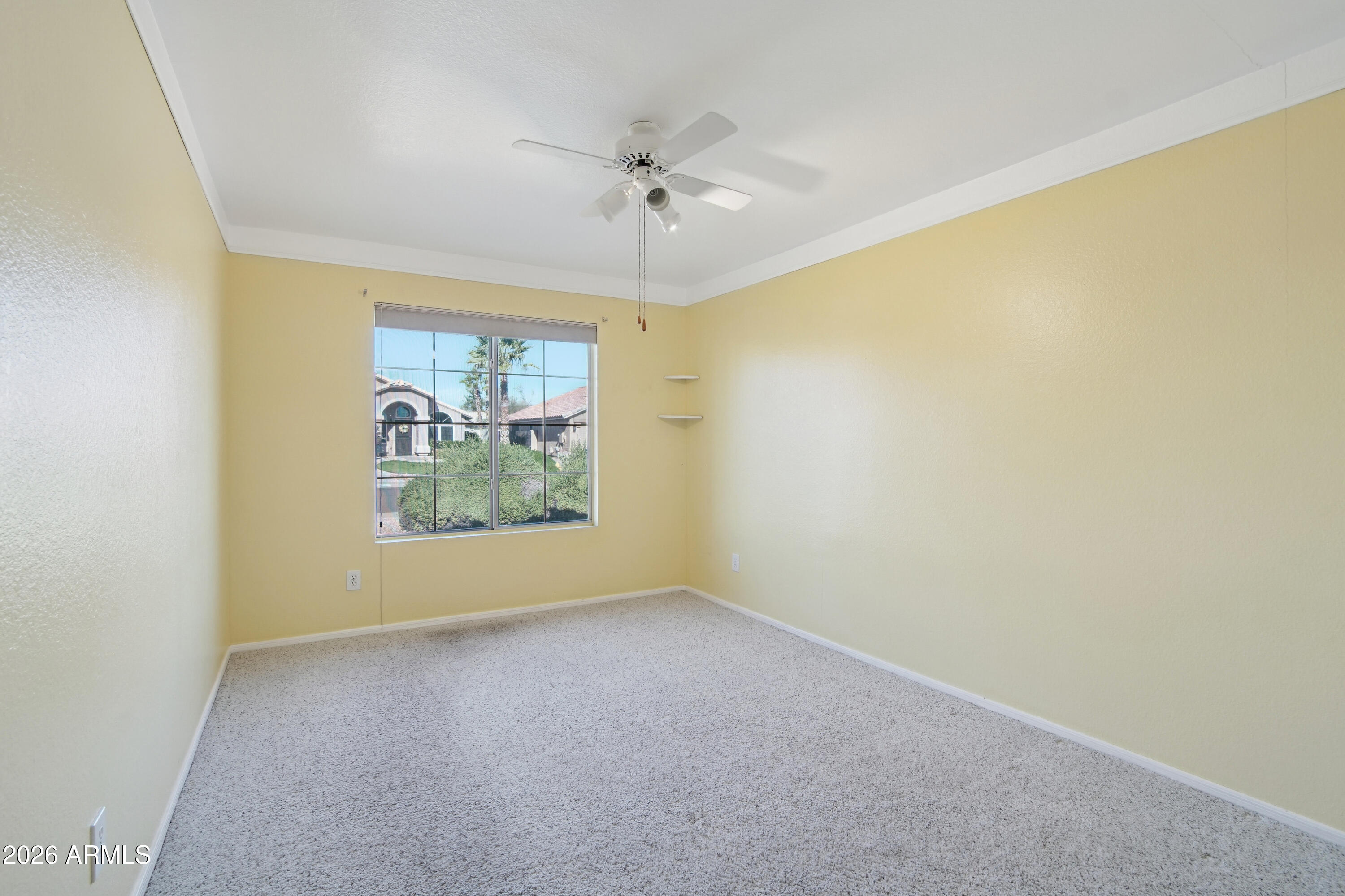 9729 West Burnett Road Peoria, AZ 85382 - Photo 18 of 29 an empty room with a window