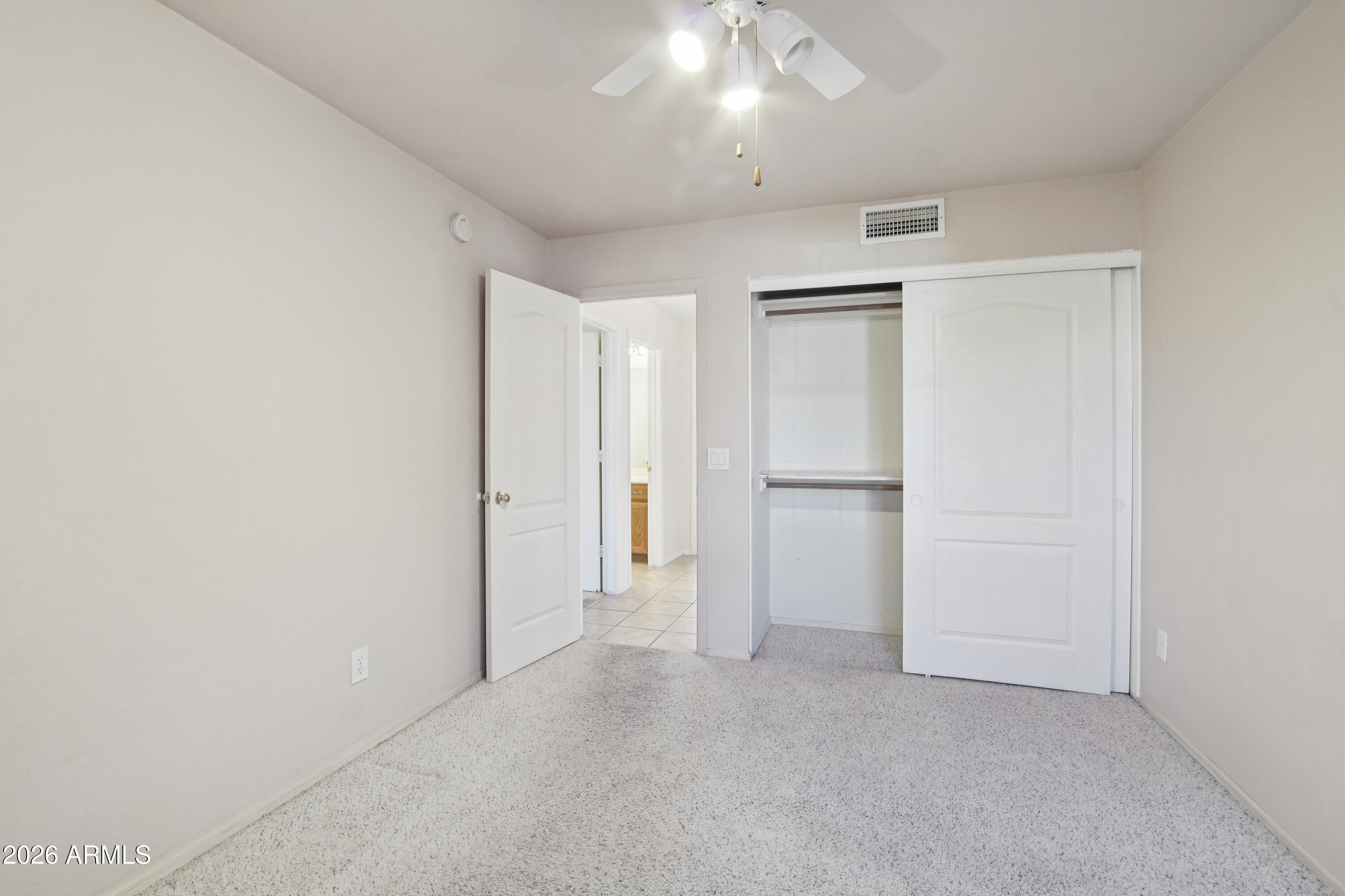 9729 West Burnett Road Peoria, AZ 85382 - Photo 21 of 29 an empty room with a empty space